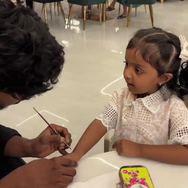 Child enjoying a hands-on creative pretend-play activity at Wooray Hyderabad.