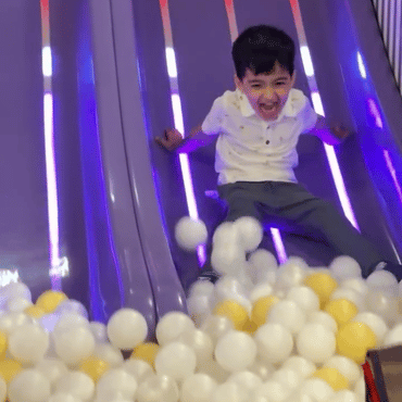 Children enjoying an interactive play activity together at Wooray Hyderabad.