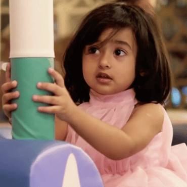 Child enjoying an indoor play activity at Wooray Dehradun.